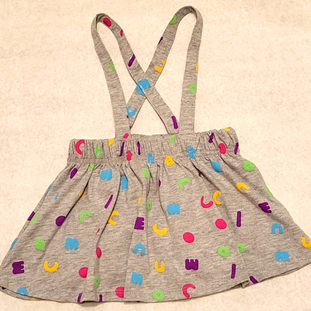 Cocomelon light grey alphabet jumper dress